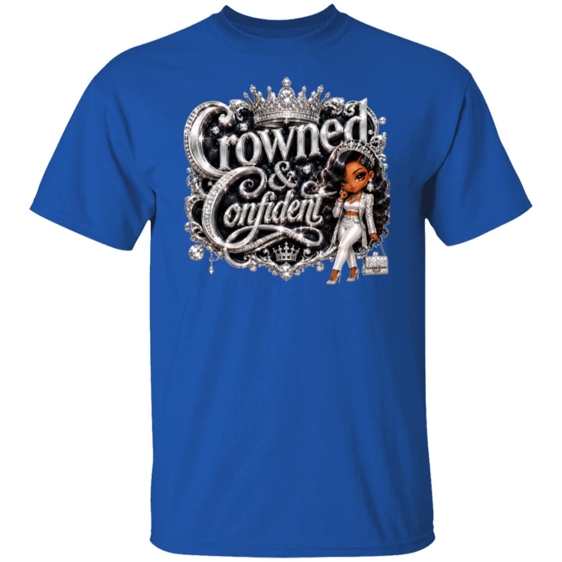 A royal blue short-sleeve crewneck t-shirt featuring a large graphic print on the front. The graphic displays the words 'Crowned & Confident' in an ornate silver metallic font with a crown above, alongside an illustration of a Black woman in a white outfit holding a purse.