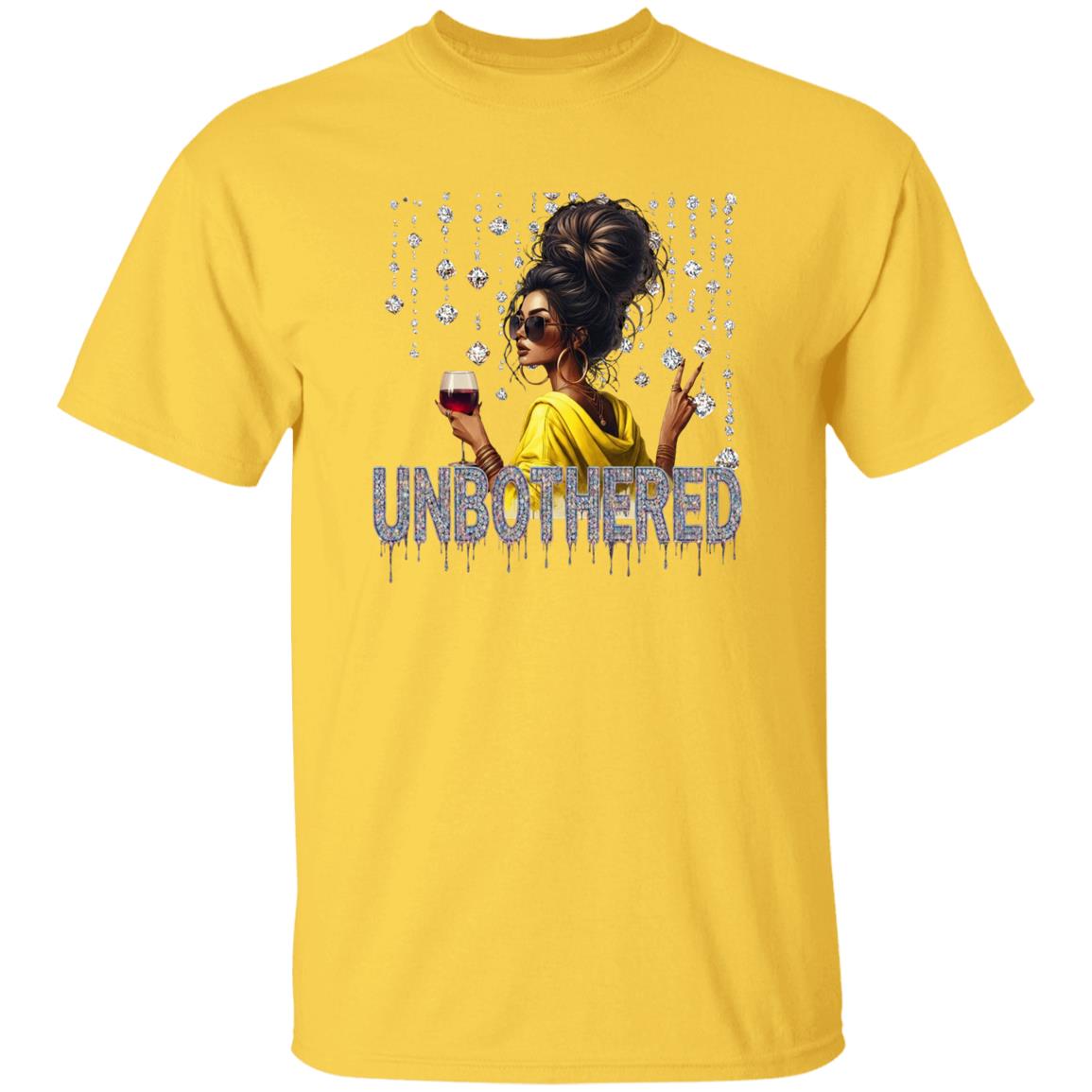 yellow graphic t-shirt featuring an 'Unbothered' design with a stylish woman wearing sunglasses, holding a wine glass, flashing a peace sign, and surrounded by sparkling rhinestones