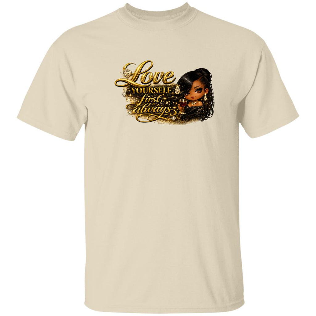 A woman wearing a natural short-sleeve crewneck t-shirt with a graphic print on the front. The graphic features the text 'Love yourself first, always.