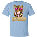 a light blue  graphic tee of a leopard wearing pink sunglasses and a pink bubblegum mouth, with the word 'UNBOTHERED' in gold glitter-style lettering below. 