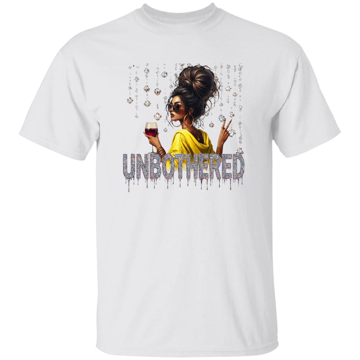 White graphic t-shirt featuring an 'Unbothered' design with a stylish woman wearing sunglasses, holding a wine glass, flashing a peace sign, and surrounded by sparkling rhinestones