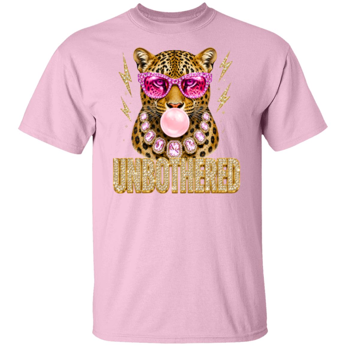a pink  graphic tee of a leopard wearing pink sunglasses and a pink bubblegum mouth, with the word 'UNBOTHERED' in gold glitter-style lettering below. 